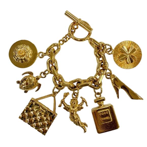 CHANEL Jewelry - CHANEL Vintage Metal Icon Charm 7-Strand Bangle Bracelet, Gold, Weight 205g, ...